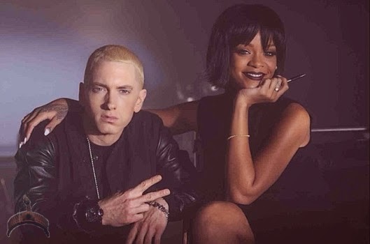 riri9 Eminem raps about giving Rihanna head.