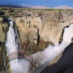 The Augrabies Falls is located on the Orange River in South Africa. The falls are about 60m tall, and residents have named it Ankoerebis, or ‘place of big noises.’ The gorge at the falls is 240m deep and 18m long.
