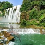 Huangguoshu Waterfall, known as Yellow Fruit Tree Waterfall, is the largest within China and East Asia. It is located on the Baihe River, and is 77.8 meters tall and 101 meters wide.