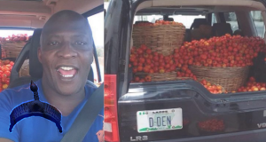 man buys fresh tomatoes