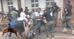 police fighting for bucket