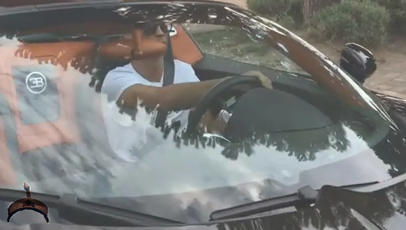 Cristiano Ronaldo driving his £1.7million Bugatti Veyron in his mansion