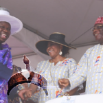Lagos State Governor, Mr. Akinwunmi Ambode (left), with retired Justice George Oguntade (right) and his wife, Modupe (middle) during the Eyo Festival as part of activities marking the Lagos @50 celebrations at the Tafawa Balewa Square (TBS), Lagos Island, on Saturday, May 20, 2017