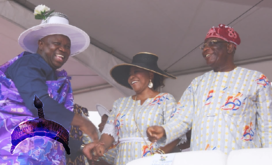 Lagos State Governor, Mr. Akinwunmi Ambode (left), with retired Justice George Oguntade (right) and his wife, Modupe (middle) during the Eyo Festival as part of activities marking the Lagos @50 celebrations at the Tafawa Balewa Square (TBS), Lagos Island, on Saturday, May 20, 2017